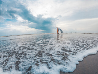 Alone girl in the sea