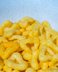 
snacks and chips on a white plate close-up