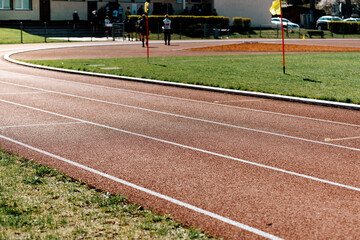 Obraz premium sports track around the sports field