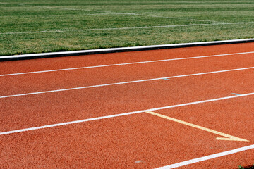 Fototapeta premium sports track around the sports field