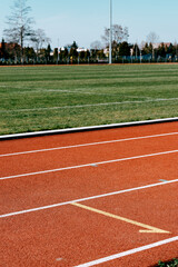 Fototapeta premium sports track around the sports field