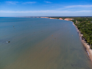 Long cliffs of Bahia, nature of Brazil in South America. Ocean and Atlantic Forest.