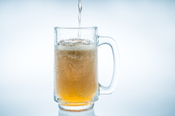beer bubbles on a clear glass white background in the studio