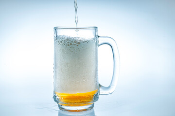 beer bubbles on a clear glass white background in the studio