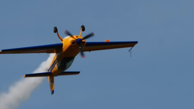 Sports plane flies inverted
