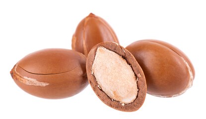 Argan seeds isolated on white background. Natural argan nuts from Morocco. Argania. Close up.