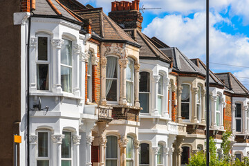 A row of typical English terraced houses in London 