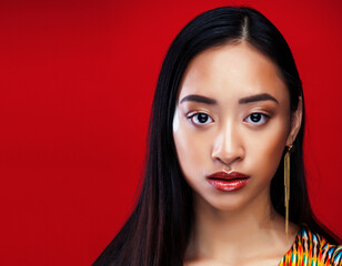 beauty young asian girl with fashion make up on red background , beauty stylish look