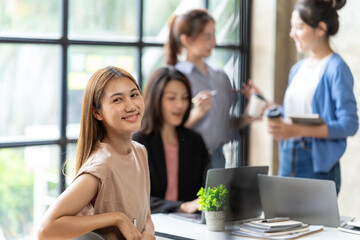 Entrepreneurs and business people conference in modern meeting room. Asian business woman team working together, startup business concept.