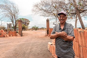 Owner of a traditional brick and clay tile manufacturing business in La Paz Centro. Concept of craft businesses in Nicaragua, Central America and Latin America. - obrazy, fototapety, plakaty