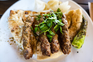 Shish Kofte (Sis Kofte in Turkish) in Antalya, Turkey. Sis Kofte is a popular local meat dish in the resort city of Antalya, Turkey. 