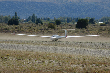 glider on land aerodrome ready to take off. gliding ultralight aircraft