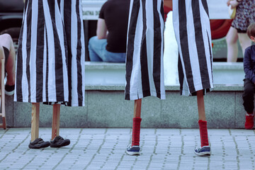 Stilts used by entertainers at a street festival