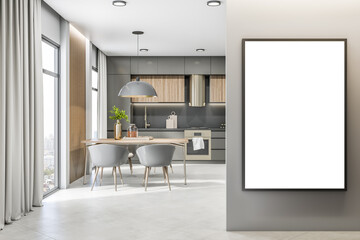 Front view on blank white poster in black frame on grey wall in sunny kitchen area with wooden table and grey furniture, concrete floor and city view from big window. 3D rendering, mockup