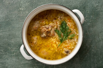 German Cabbage Soup Kohlsuppe, with cereals and vegetables, homemade