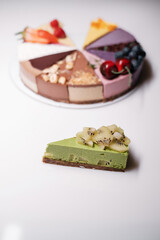Piece of cake with kiwi. Fruit dessert.