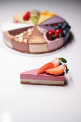 Piece of cake with strawberry. Fruit dessert.
