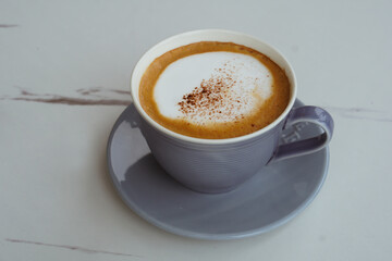  Hot cappuccino in a warm atmosphere.