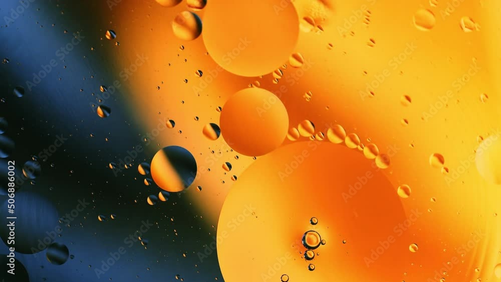 Poster real abstract colourful oil drops in water rotation with color gradient mixing background.