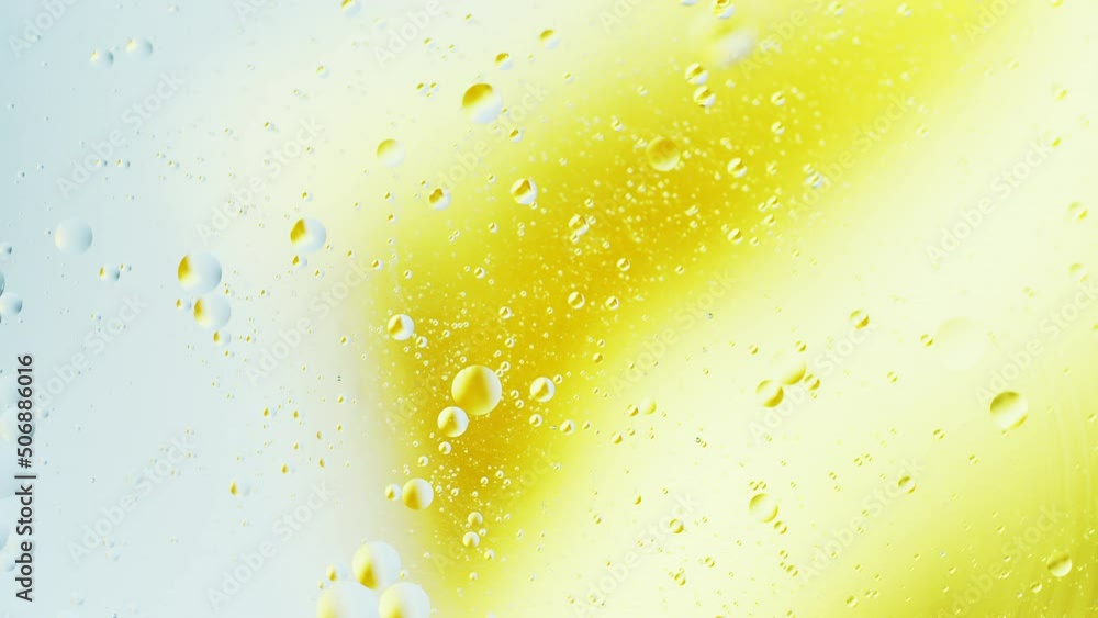 Poster real abstract colourful oil drops in water rotation with color gradient mixing background.