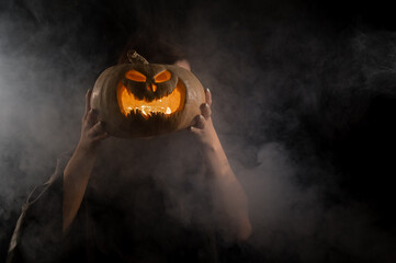 Pumpkin jack o lantern instead of a woman's head. Halloween