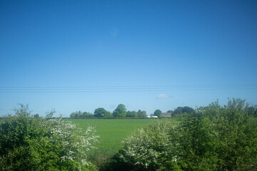A landscape image taken on a sunny day in the Welsh valley countryside.