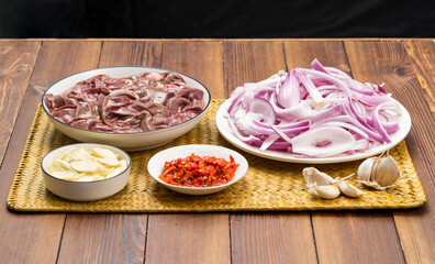 Sichuan-style home cooking - fried pork liver with onions