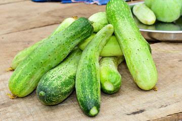 cucumbers on a wooden table
