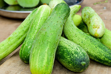 cucumbers on a wooden table