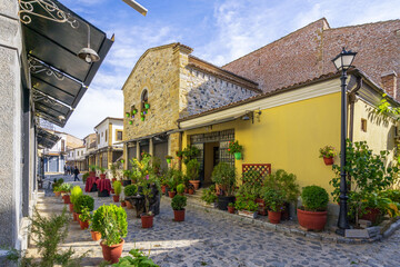 One of the sights of Korca, Albania, ottoman Old Bazaar with blue cloudy sky. - obrazy, fototapety, plakaty