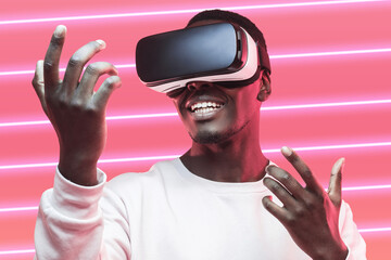 Metaverse gaming. African man looking at his hands through vr glasses in virtual reality headset