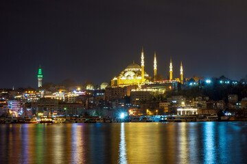 Fototapeta na wymiar Stunning views of Istanbul cityscape over Bosphorus at night.