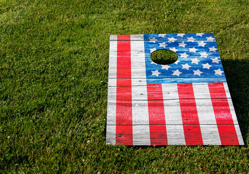 American Flag corn hole game on grass