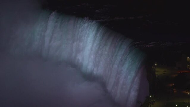 4K Video Sequence of Niagara Falls, Canada - The Horseshoe Falls at night as seen from the Skylon Tower