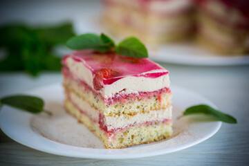 strawberry poppy cake with cream in a plate