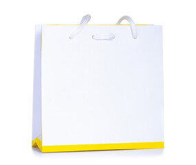 White shopping paper bag packing on white background isolation