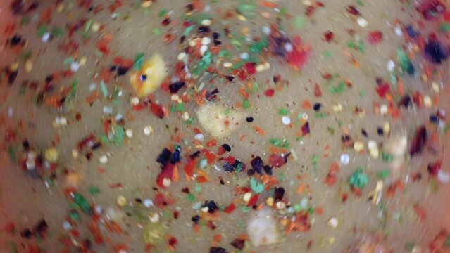 Hot sour spicy sweet liquid In a plastic dish. Making hot sour spicy sweet liquid mixer. Traditional and popular street food item Chotpoti in the Indian subcontinent.