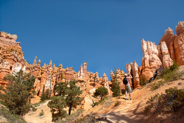 Bryce Canyon National Park, Utah, United States. Hoodoos and rock formations. Man taking photo in Bryce canyon,