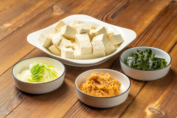 The production process of Japanese tofu and wakame miso soup