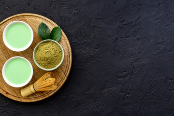 Matcha tea powder with green hot drink - asian tea ceremony