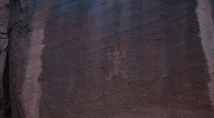 Oljato - Monument Valley Navajo petroglyph on a rock, Utah, Arizona, USA