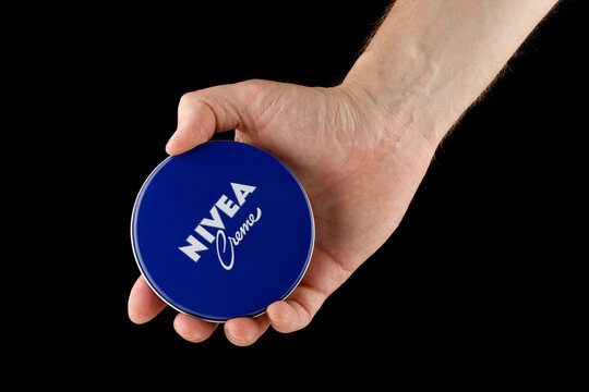 LVIV, UKRAINE - May 13, 2022: Nivea Creme in hand