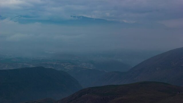4K Timelapse Sequence of Quito, Ecuador - The mountains of Quito and the valleys during a cloudy sunrise