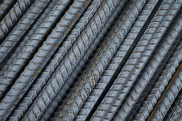 Steel rebar piles overlap for construction use.