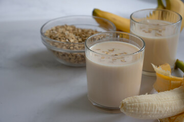 Yogurt, banana, oatmeal, healthy breakfast smoothie