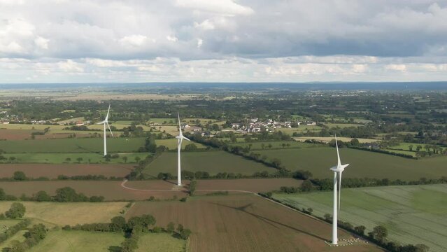 4K Video Sequence of Meotis, France - The wind turbine in Meotis Normandy during a sunny day