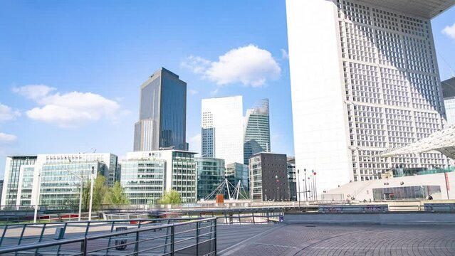 4K Timelapse Sequence of Paris La Defense, France - The Arch of la Defense in the financial district of Paris during the day