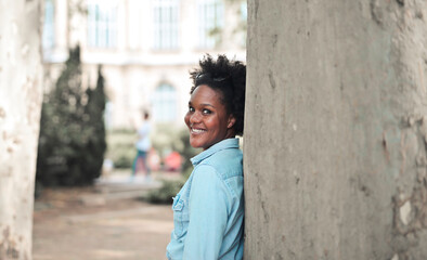 portrait of a smiling woman in a park