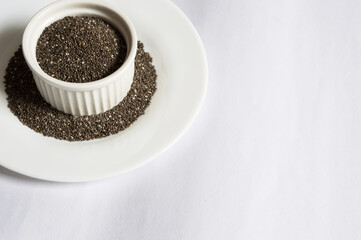 Small white bowl with chia seeds
