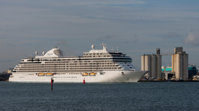 Southampton, England,UK. 2022.  Cruise liner passing silos as the Seven Seas Splendor luxury liner makes her way out of port.